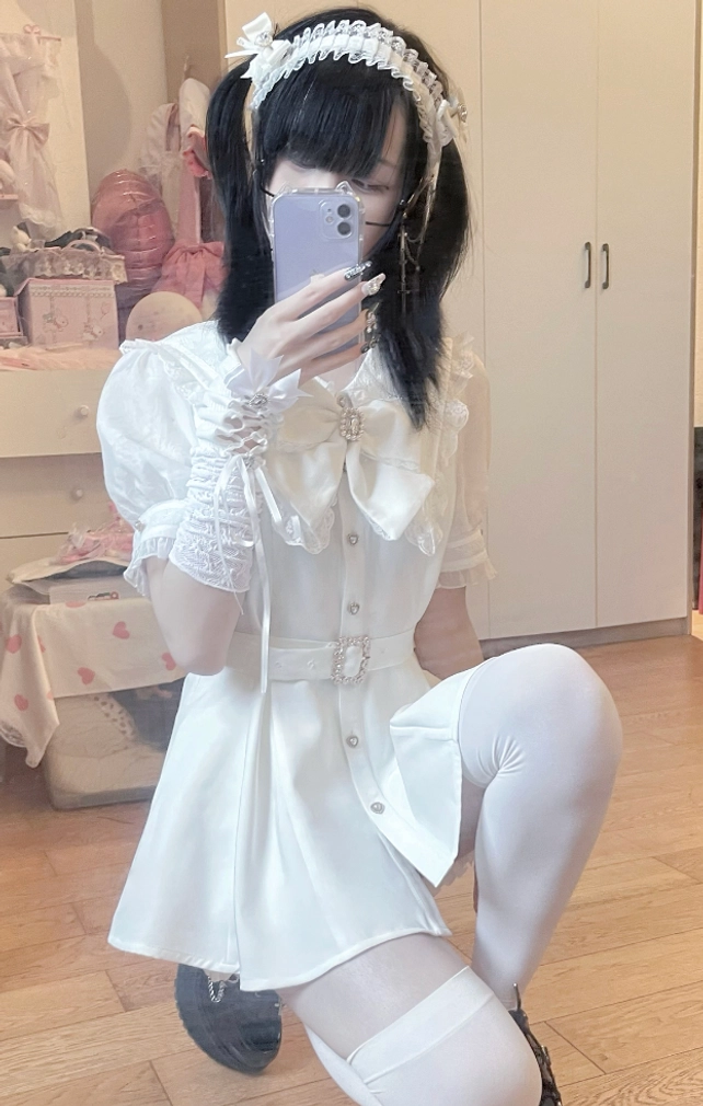 White ruffled bow Jirai Kei blouse shorts set with puff sleeves jewel front bow waist belt thigh high socks kneeling selfie