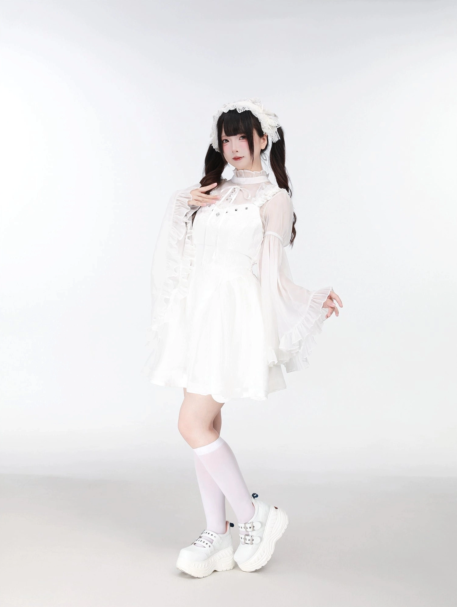 White Jirai Kei two-piece set three-quarter front angle showing high ruffled collar and platform shoe styling