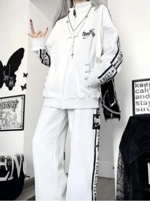 White gothic zip-up jacket and wide-leg pants Jirai Kei set with stripe prints and cross motifs - full-body front view on female model
