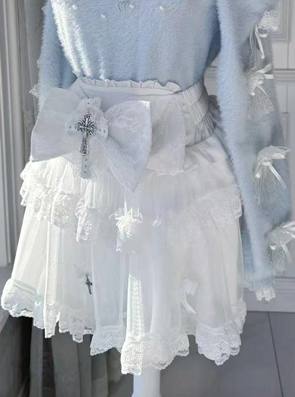 White high-waist Jirai Kei cross-detail mini skirt with layered tulle construction, elastic waist design, and removable bow accent, complete skirt product display shot