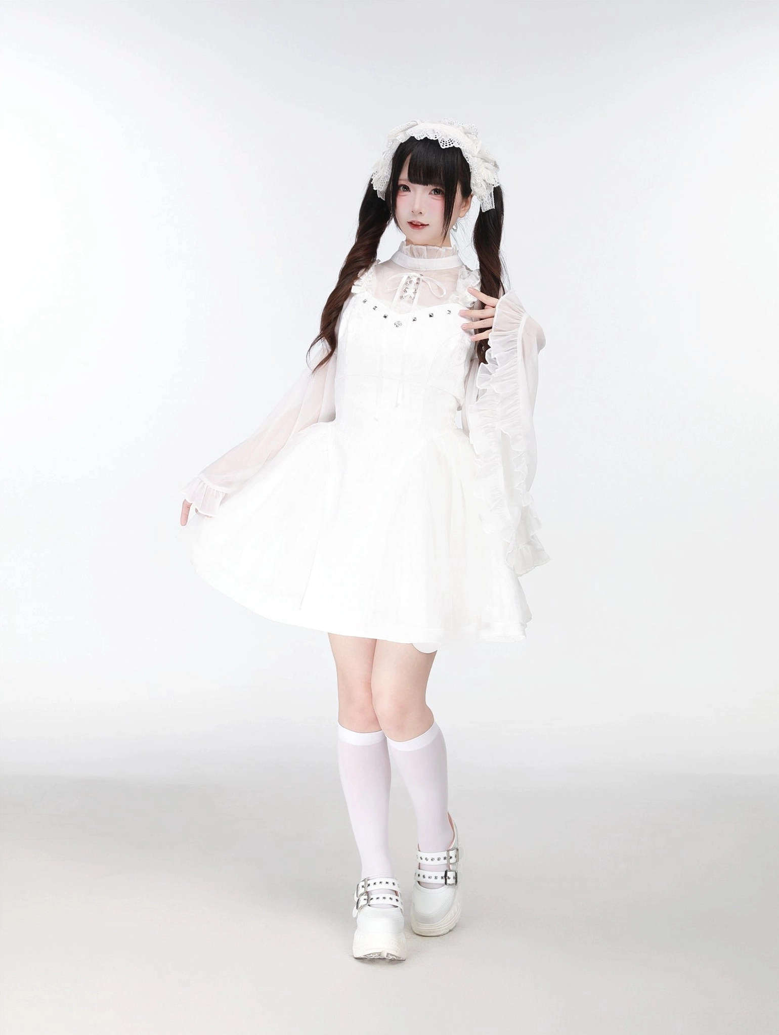 White Jirai Kei jumper dress hime-sleeved blouse front view with knee-high socks showing ruffled dress hem