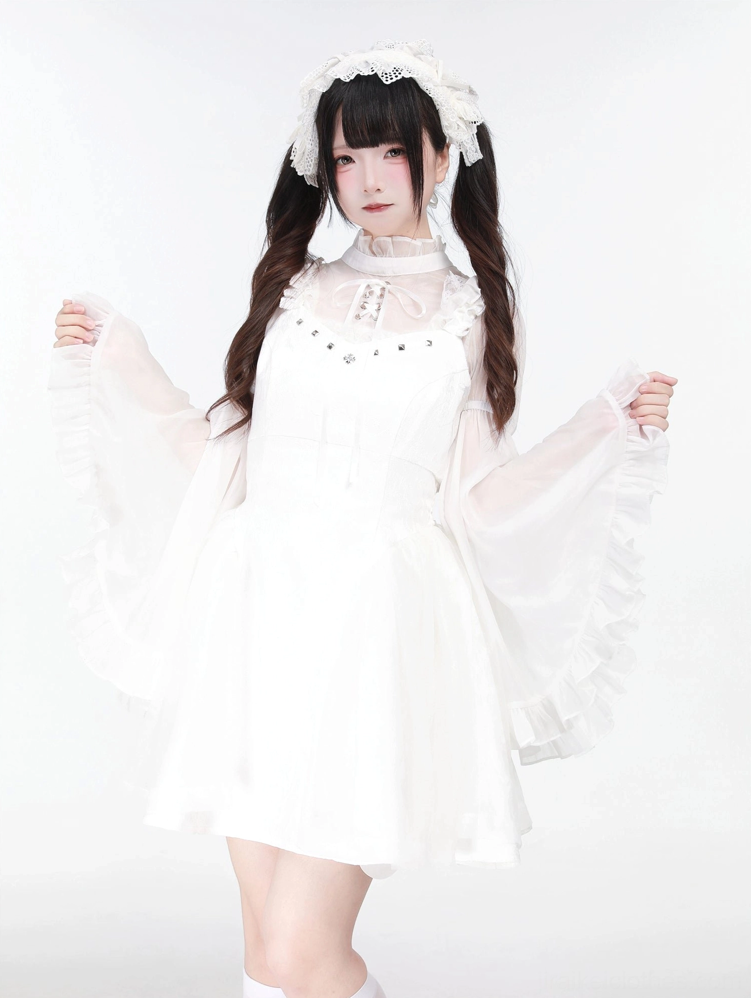 White Jirai Kei jumper dress with hime-sleeved sheer blouse front studio view pearl adorned bodice and dramatic ruffled sleeves