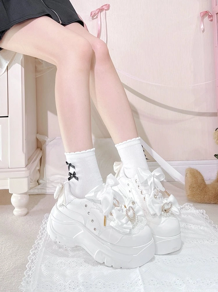 White Jirai Kei platform shoes with all included accessories, bow clips, insole, complete package contents, what's in the box showcase
