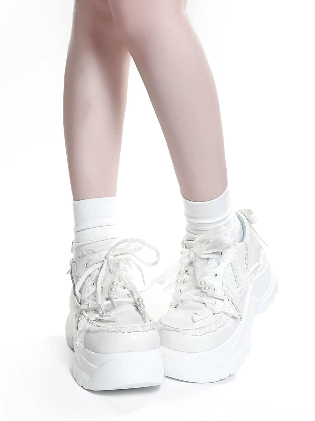 White Jirai Kei platform shoes front and side perspective showing lace-up design faux pearl details and complete shoe construction