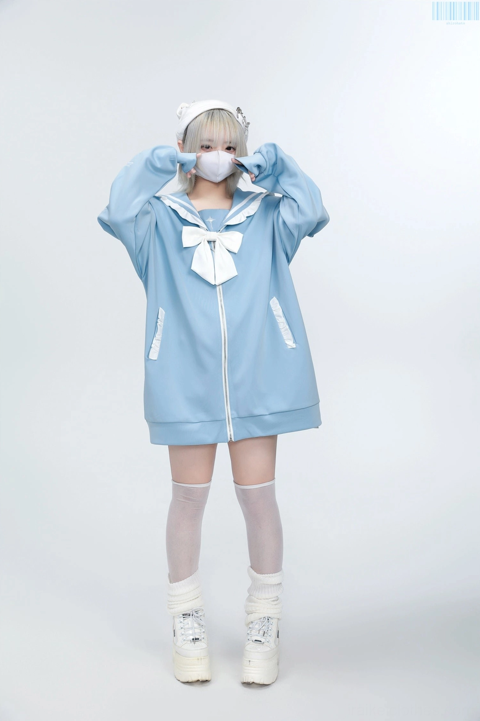White Jirai Kei sailor jacket with light purple embroidered details and removable padding feature, close-up texture view