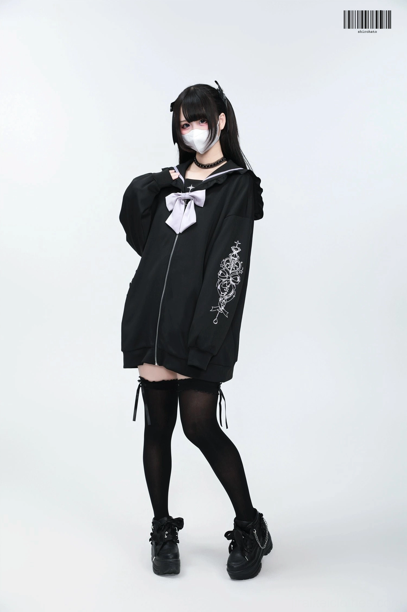 White Jirai Kei sailor jacket with light purple embroidery and detachable bow, removable padding feature display