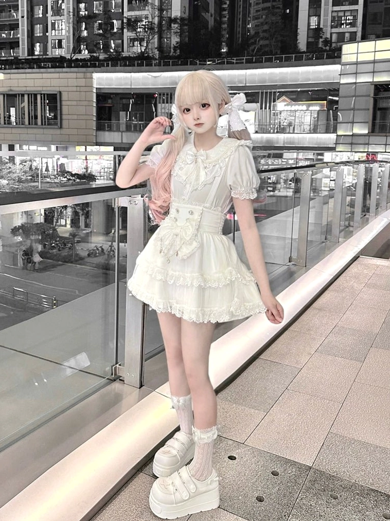 White Ryousangata skirt and blouse set three-quarter view featuring thick platform shoes with heart-shaped lace socks, complete Jirai Kei aesthetic styling