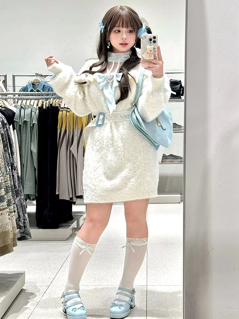 Back view of white Jirai Kei sweater dress showing collar construction and ruffle trim detailing on off-shoulder design