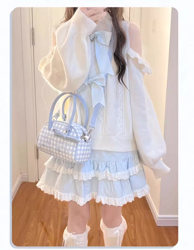 Jirai Kei styling inspiration showing white velvet sweater layered with alternative fashion accessories and components