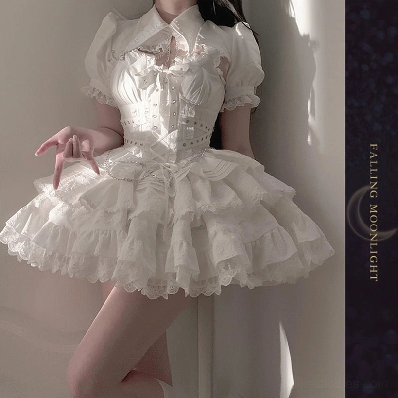 White Lolita JSK dress partial model view showcasing Peter Pan collar puff sleeves tiered ruffled skirt construction