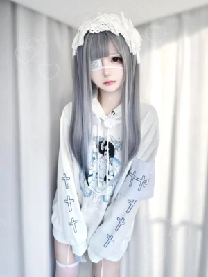 White medical angel tenshi hoodie with cross sleeve prints front view worn by lolita model indoors