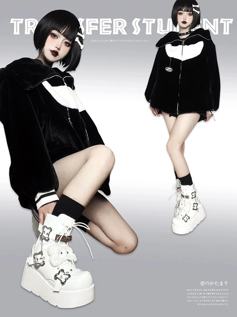 White platform Martin boots side low view with star-shaped metal buckles, chunky white platform sole, worn with black heart-patterned coat - subculture aesthetic