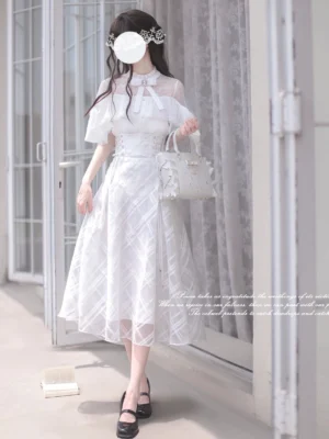 White Ryousangata cape dress set front three-quarter view vintage French-style indoor setting romantic Jirai Kei two-piece ensemble
