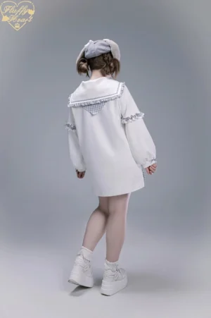 White sailor collar oversized sweatshirt dress with gingham collar trim and ruffled cuffs back full body studio view