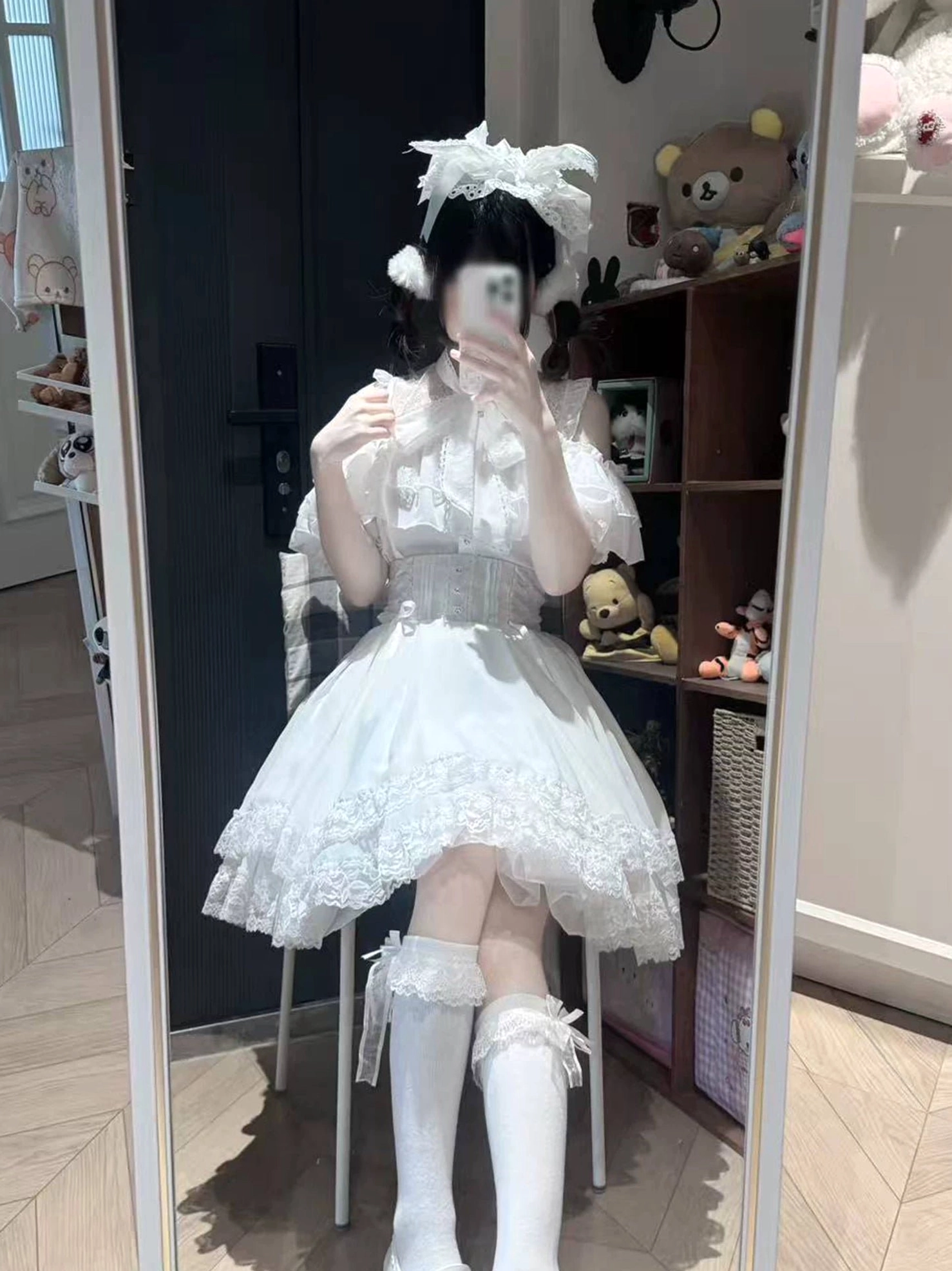 Short white frilly Jirai Kei dress high waist design with lace-trimmed thigh-high socks mirror view