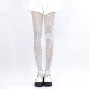 White spiderweb fishnet tights front full leg view with white shorts platform mary jane shoes jirai kei style