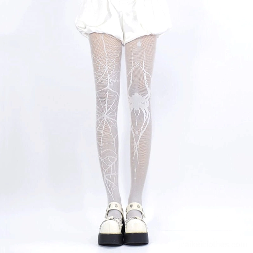 White spiderweb fishnet tights front full leg view with white shorts platform mary jane shoes jirai kei style