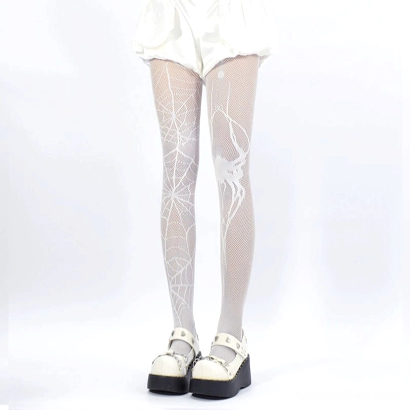 White spiderweb fishnet tights front full leg view white shorts platform shoes jirai kei styling