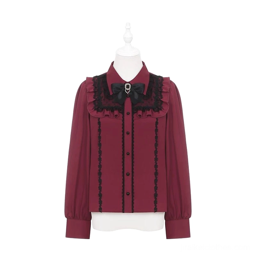 Mannequin product display of wine-red long-sleeved Jirai Kei blouse featuring Peter Pan lace collar, front bow trim detail, delicate ruffles, and burgundy buttoned placket