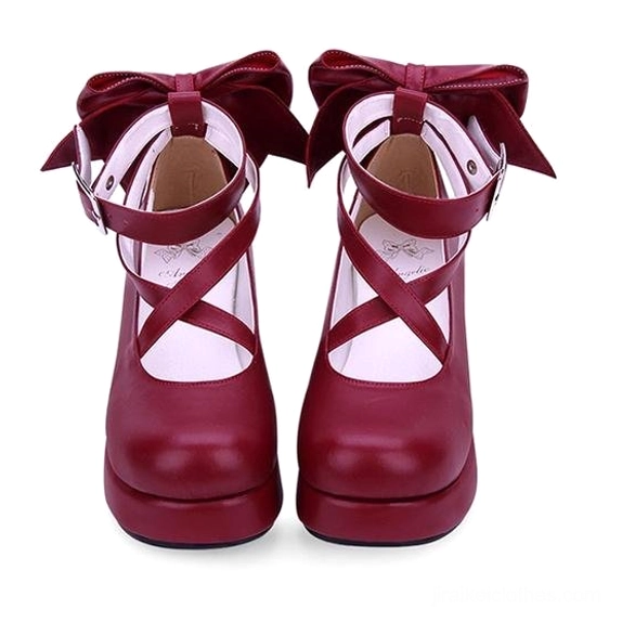 Wine red Jirai Kei platform shoes with prominent back bow design, crisscross ankle strap, smooth PU leather upper, front flat perspective