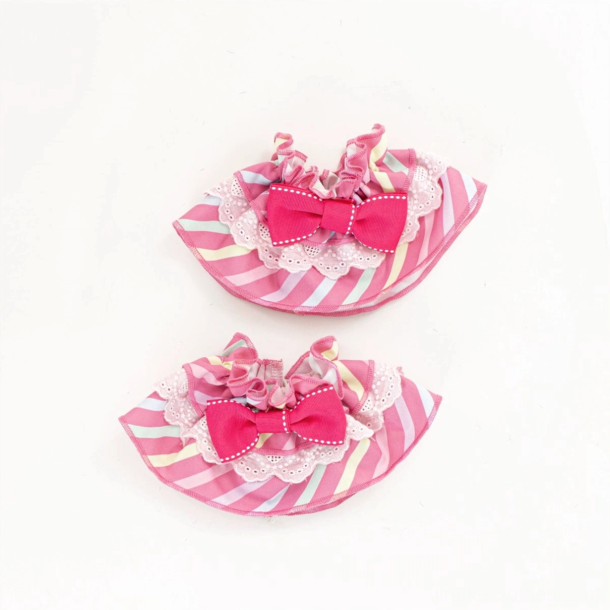 Wrist cuffs detail from sweet Lolita salopette showing finishing quality and coordinated design integration