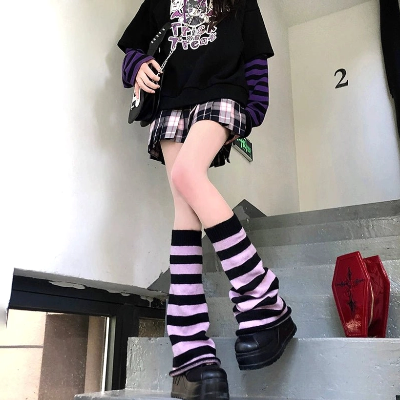 Y2K Jirai Kei black and purple horizontal striped leg warmers with slouchy fit worn on staircase by female model in casual streetwear