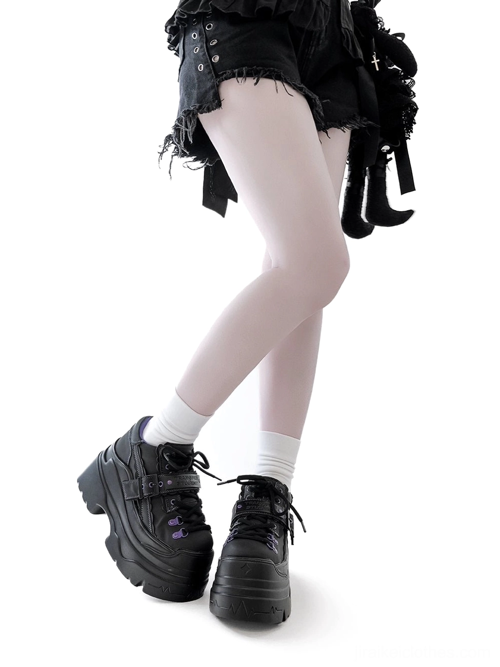 Y2K jirai kei platform shoes detailed view showcasing craftsmanship, space leather upper, purple eyelet hardware accents, and chunky platform sole