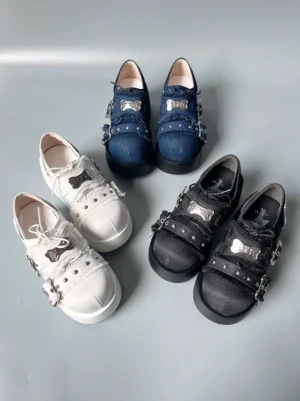 Y2K jirai kei punk platform slip-on shoes flat lay all four colors denim blue white black patent leather bone buckle metal details