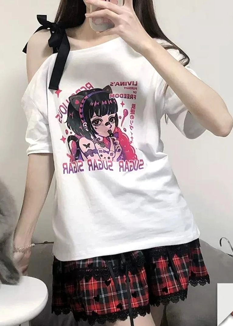 Back upper-body view of white off-shoulder anime graphic tee with black bow cold-shoulder strap detail paired with red-black plaid skirt